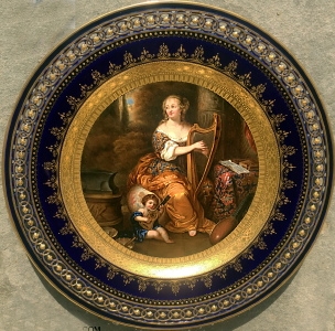 Meissen plate with old masters painting within dark cobalt blue reticulated border