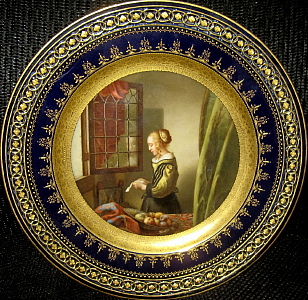 Meissen plate with old masters Vermeer painting within dark cobalt blue reticulated border
