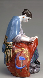 Soviet porcelain figure of Worker Sewing Red Banner by Danko